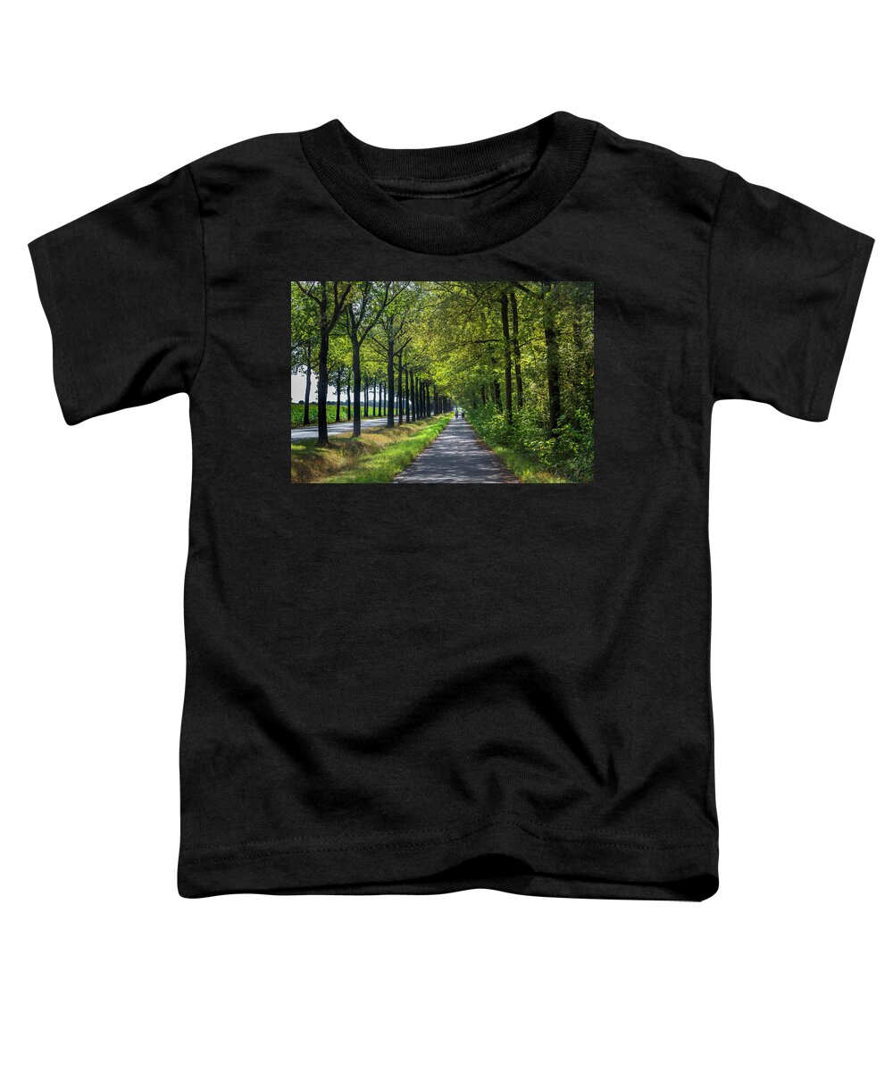 Spring Toddler T-Shirt featuring the photograph Cycling in Holland by Debra and Dave Vanderlaan