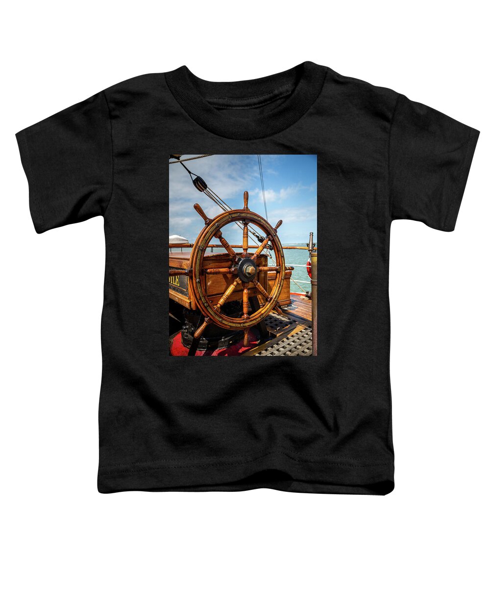 Tall Ship Wheel Toddler T-Shirt featuring the photograph The Helm Of A Tall Ship by Dale Kincaid