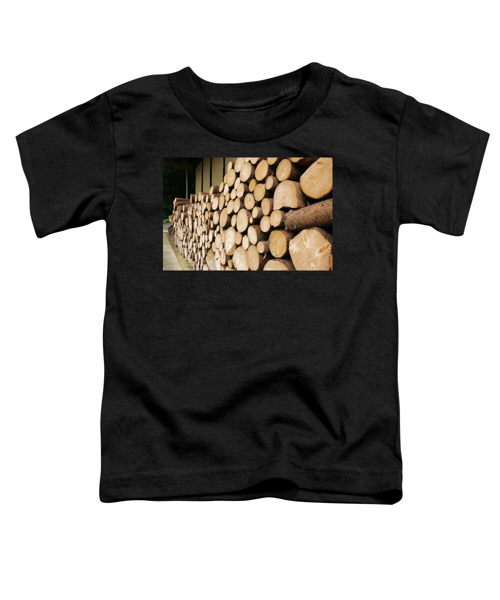 Firewood Toddler T-Shirt featuring the photograph Pile of firewood by Kaoru Shimada