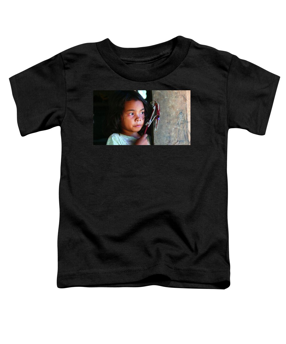 Tribal Girl Toddler T-Shirt featuring the photograph Tribal girl at the front door by Robert Bociaga