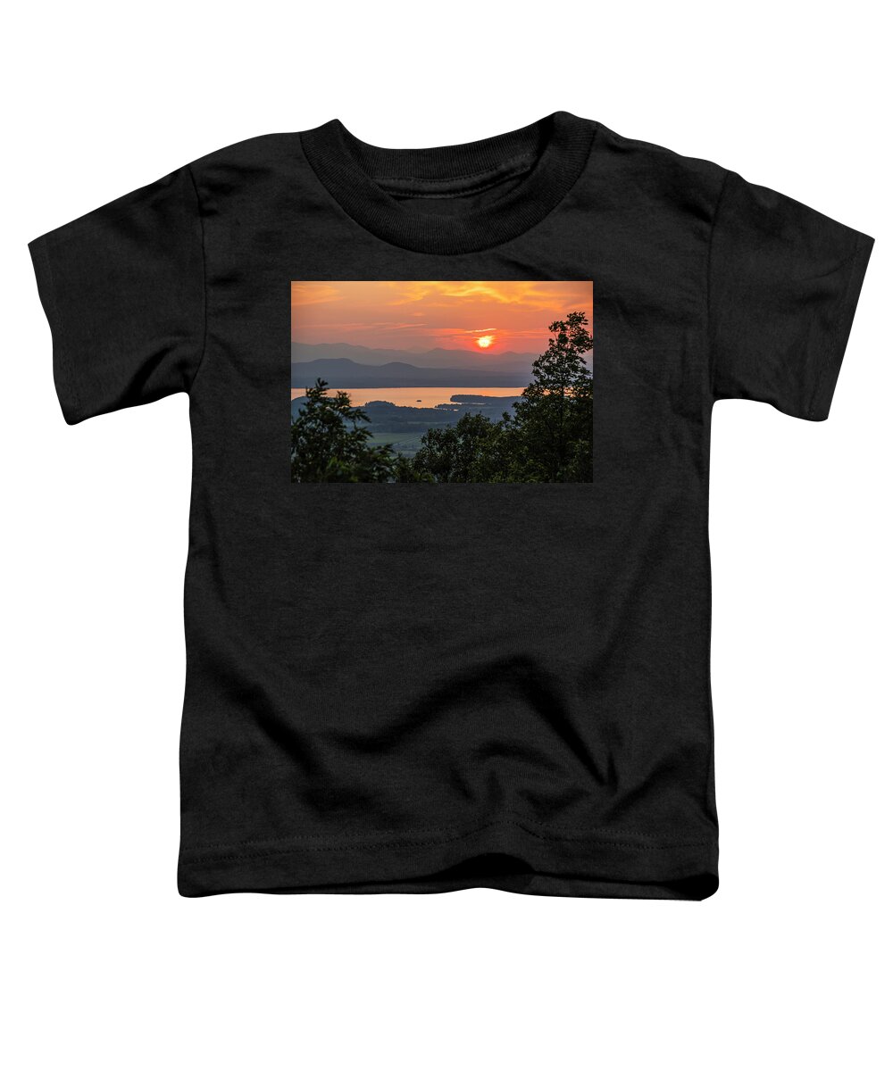 Adirondacks Toddler T-Shirt featuring the photograph Vibrant sunset through trees Lake Champlain and the Adirondacks from Mount Philo Charlotte Vermont by Toby McGuire