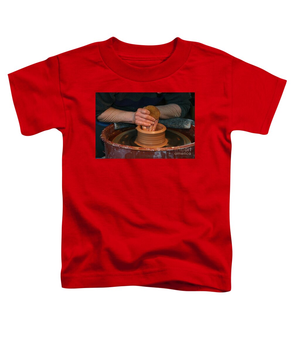 Pottery Toddler T-Shirt featuring the photograph A Potter's Hands by Marie Neder