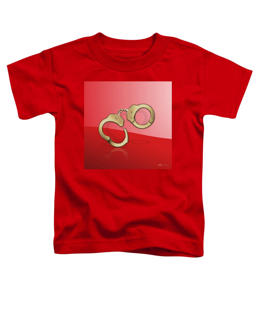 Tools Of The Trade By Serge Averbukh Toddler T-Shirt featuring the photograph Gold Handcuffs On Red by Serge Averbukh