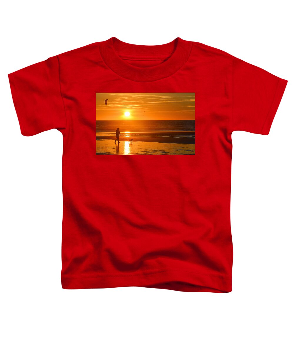 Sunset Toddler T-Shirt featuring the photograph Sunset Stroll on the Beach by AJ Schibig