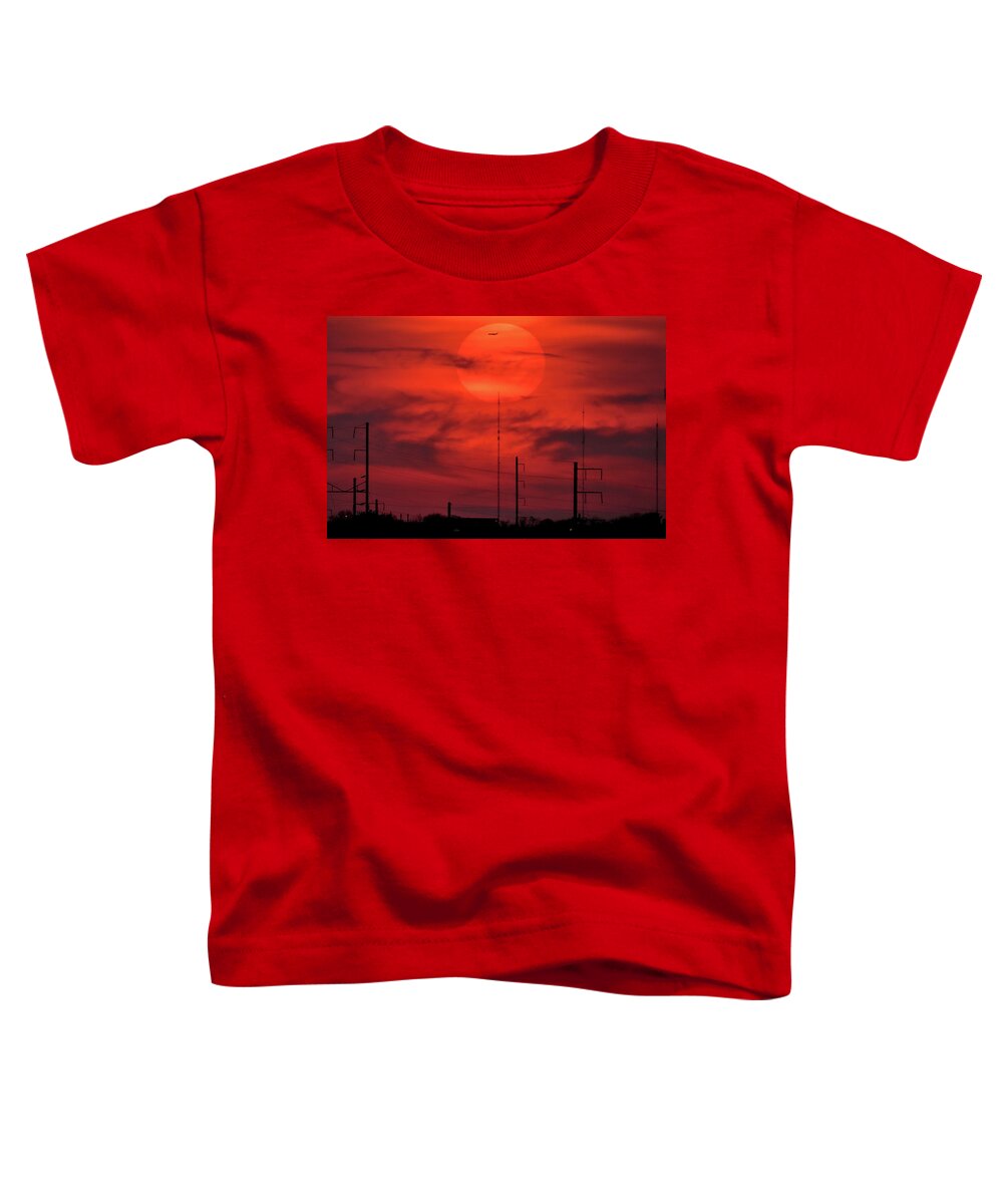 Sunset Toddler T-Shirt featuring the photograph Airplane Passing in Front of Setting Sun Over Philadelphia by Linda Stern