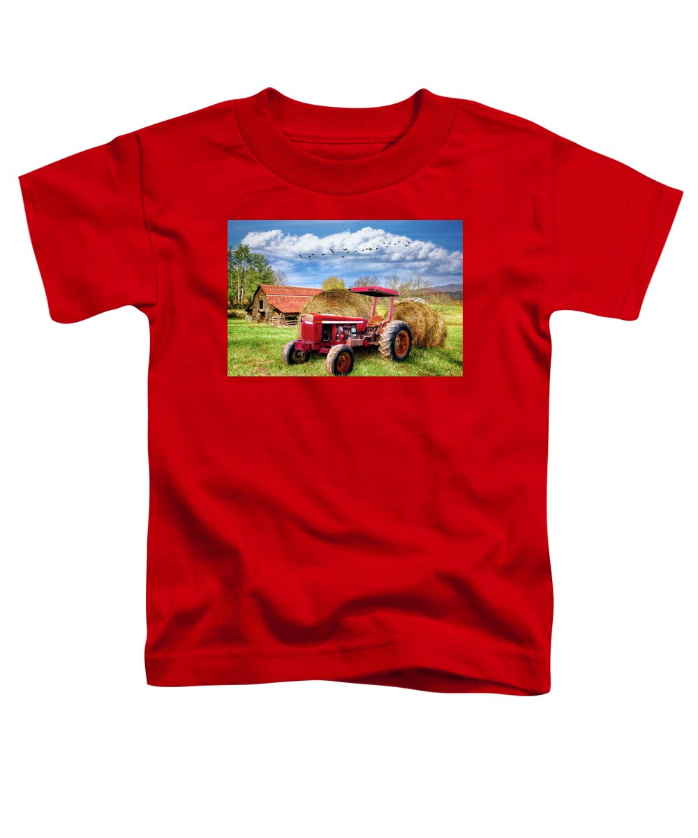 Andrews Toddler T-Shirt featuring the photograph Country Red Farm Tractor by Debra and Dave Vanderlaan