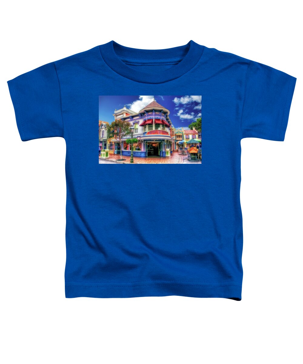 Main Street Toddler T-Shirt featuring the photograph Disney Clothiers Main Street Disneyland 01 by Thomas Woolworth