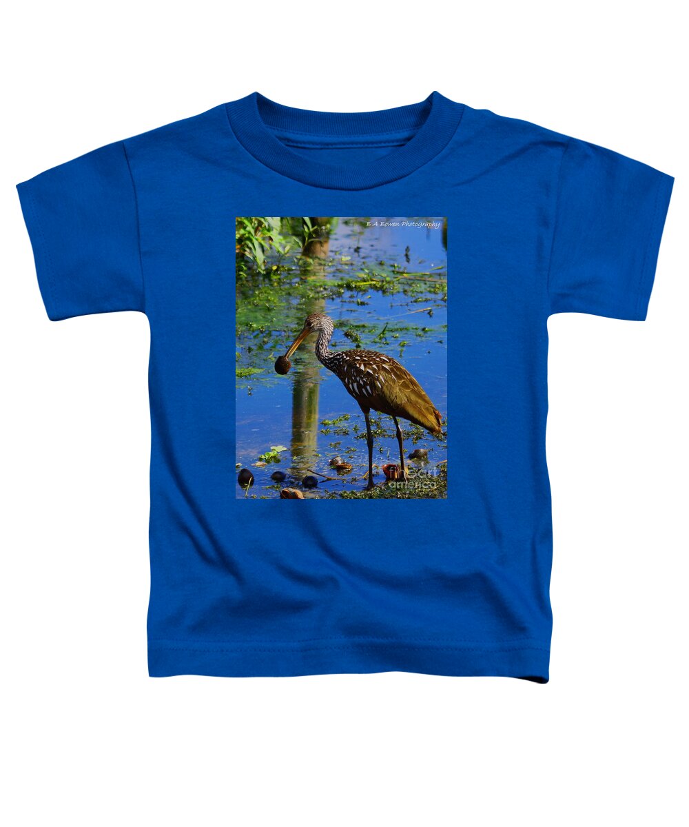 Limpkin Toddler T-Shirt featuring the photograph Limpkin with an Apple Snail by Barbara Bowen