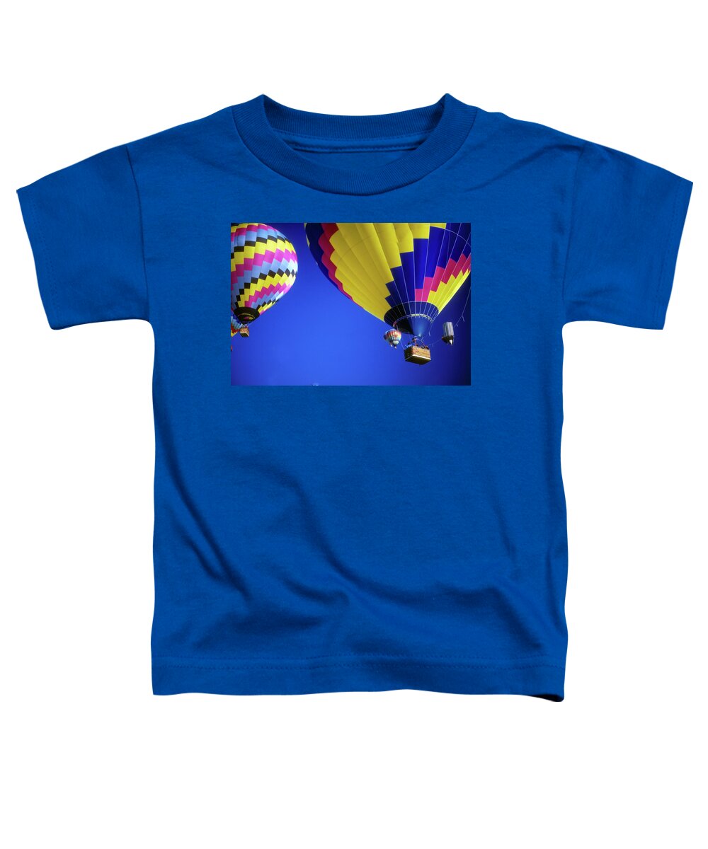 Hot Toddler T-Shirt featuring the photograph Hot air balloons against blue sky #1 by Steve Estvanik