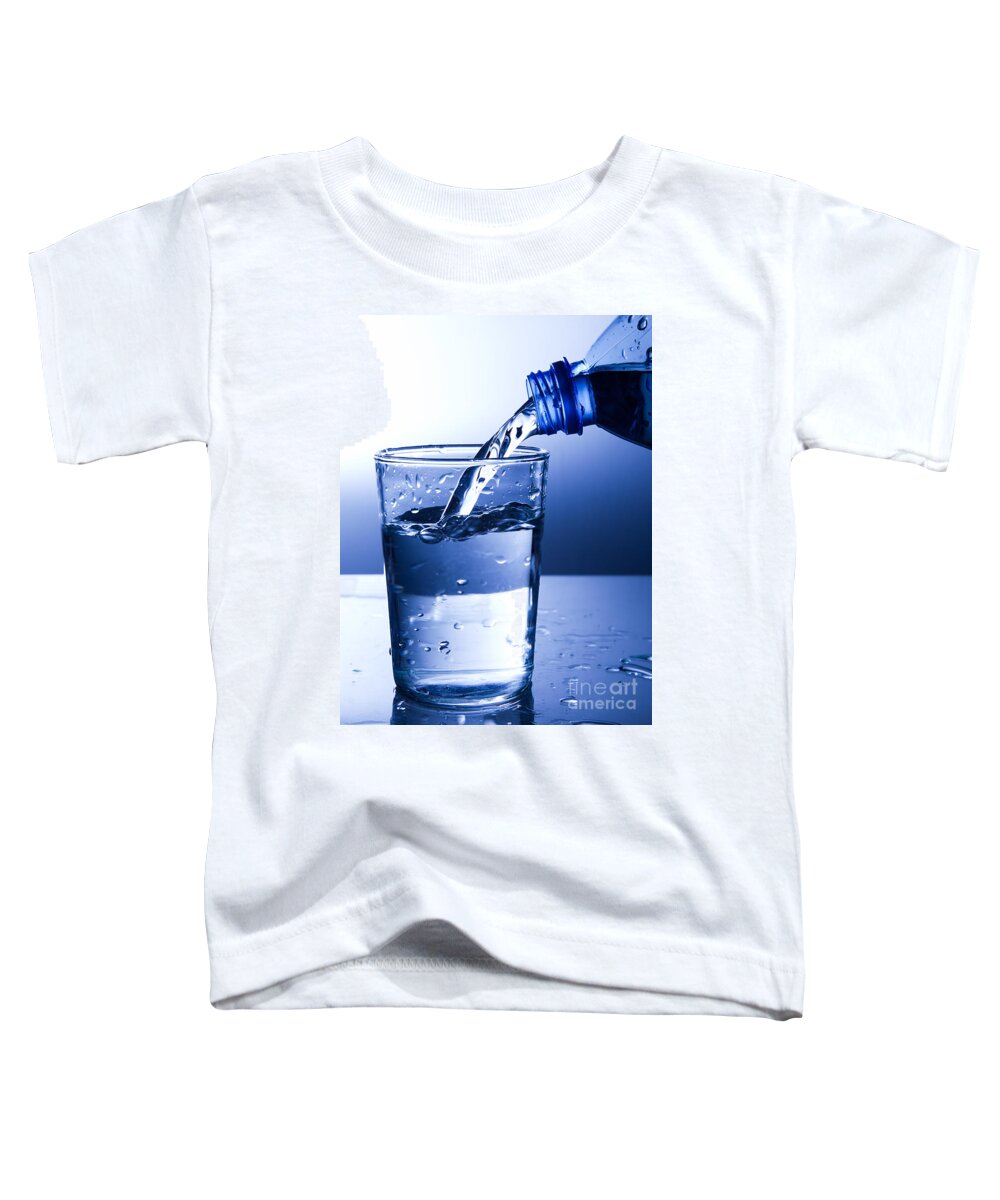 Water Toddler T-Shirt featuring the photograph Pouring fresh water into a glass #1 by Michal Bednarek