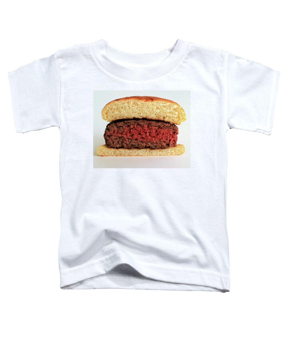 Cooking Toddler T-Shirt featuring the photograph A Rare Hamburger by Romulo Yanes
