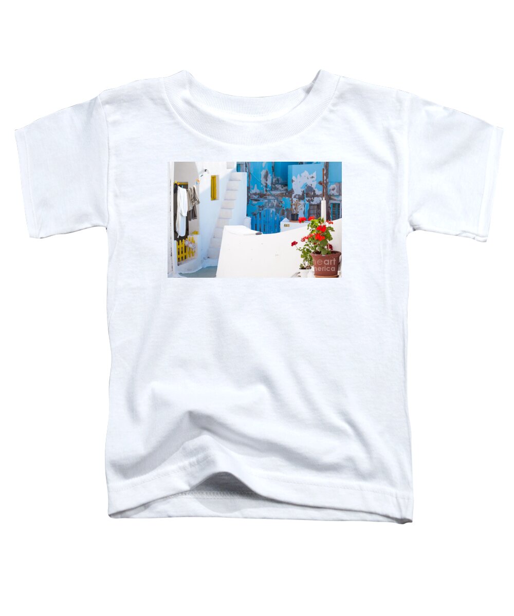 Glimpse Toddler T-Shirt featuring the photograph Glimpse of typical white houses in Oia Santorini Greece by Matteo Colombo