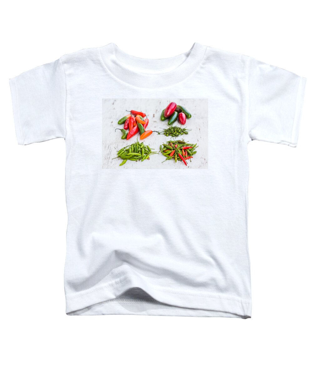 Condiment Toddler T-Shirt featuring the photograph Red And Green Chili Peppers by Voisin/Phanie