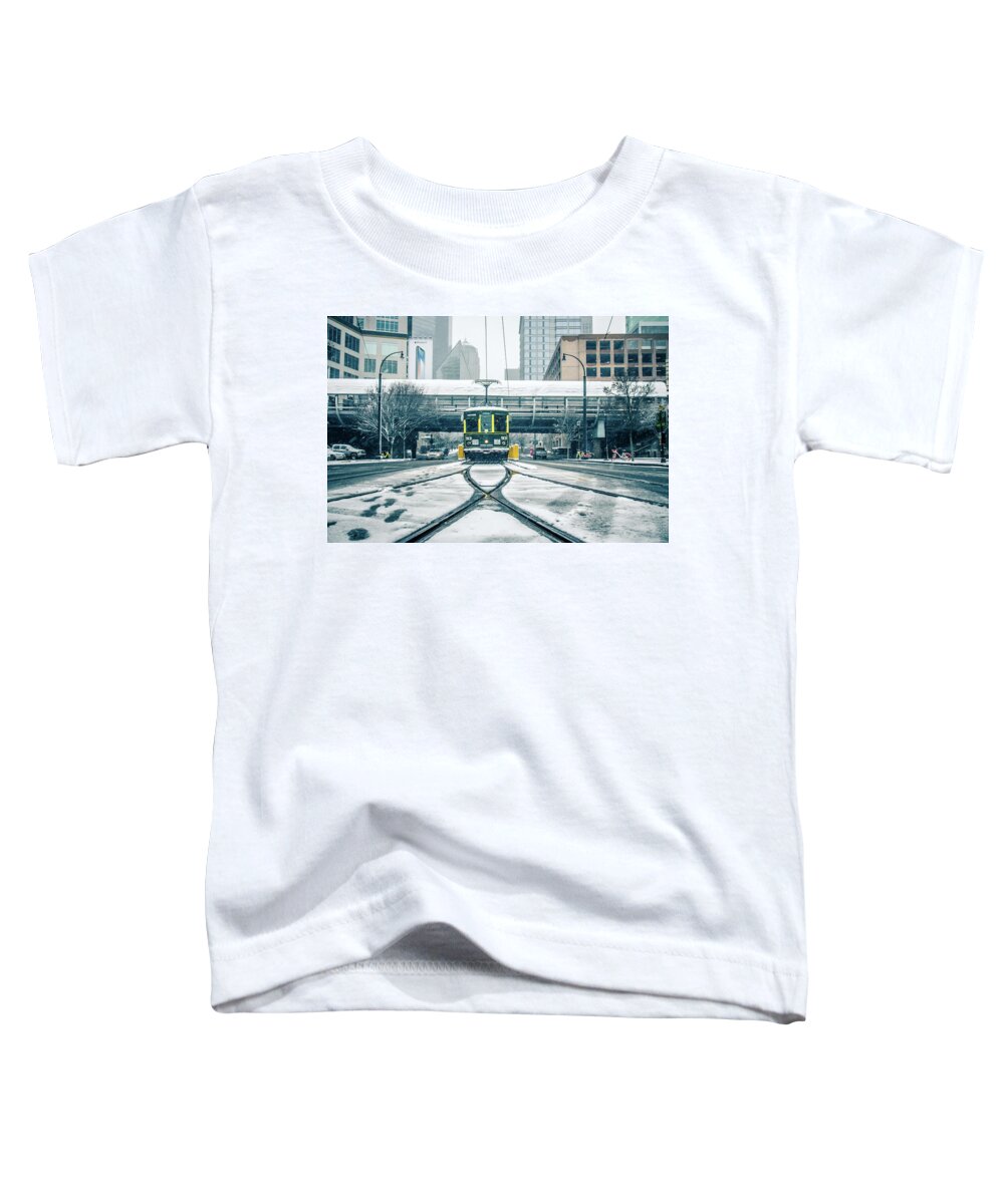 Streetcar Toddler T-Shirt featuring the photograph Streetcar Waiting For Passengers In Snowstrom In Uptown Charlott #4 by Alex Grichenko