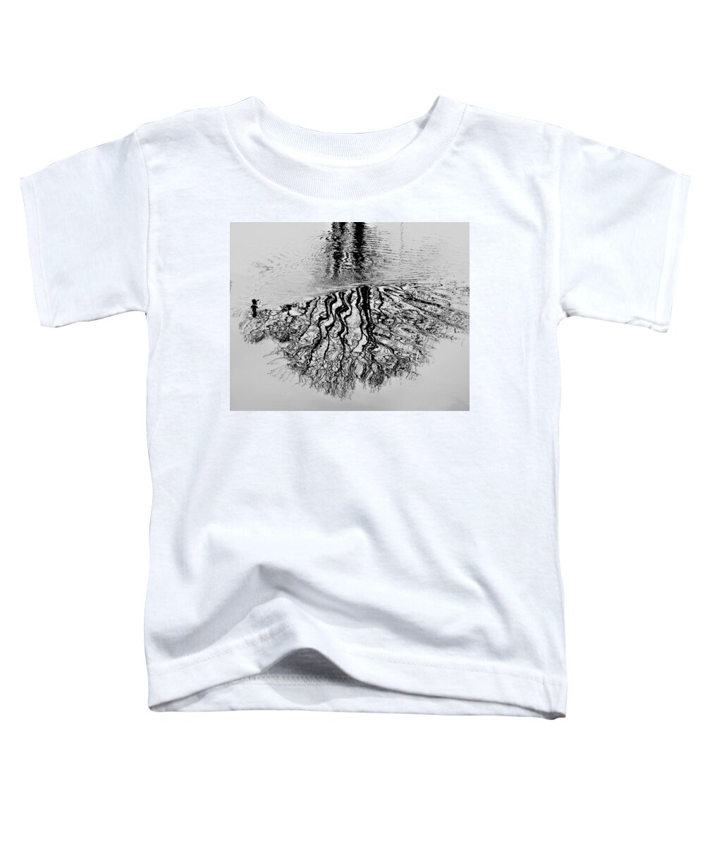 Puddle Toddler T-Shirt featuring the photograph A Duck Drawing on the Puddle of Water by Daisuke Takano