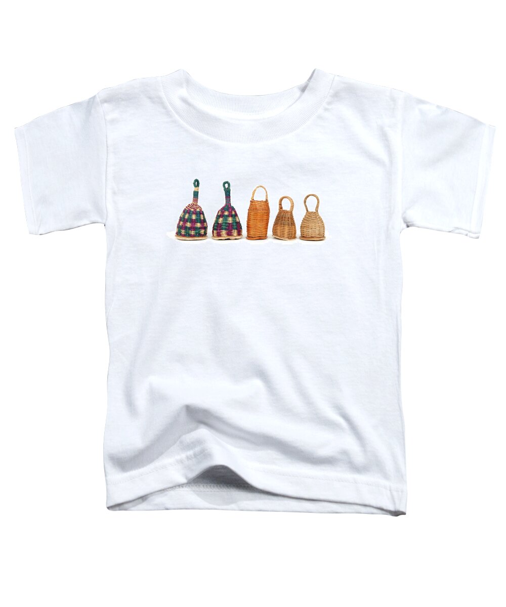 Caxixi Toddler T-Shirt featuring the photograph Caxixi shakers in a row by GoodMood Art