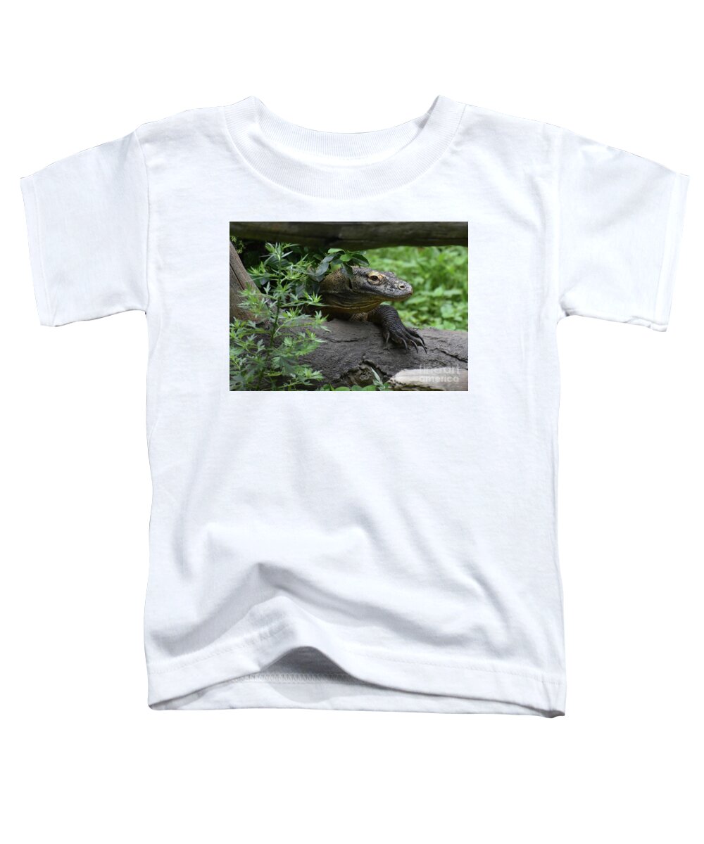 Komodo-dragon Toddler T-Shirt featuring the photograph Creeping Komodo Monitor Climbing Under a Fallen Log by DejaVu Designs