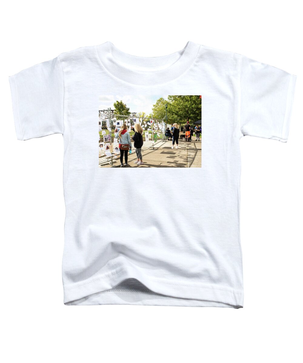 Fence Filled With Lives Toddler T-Shirt featuring the photograph Fence Filled with Lives by Tom Cochran
