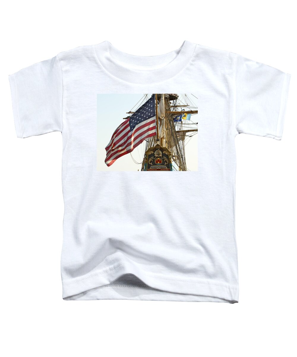 Kalmar Nyckel American Flag Tall Ship Wilmington Delaware Penns Landing Philadelphia Toddler T-Shirt featuring the photograph Kalmar Nyckel American Flag by Alice Gipson