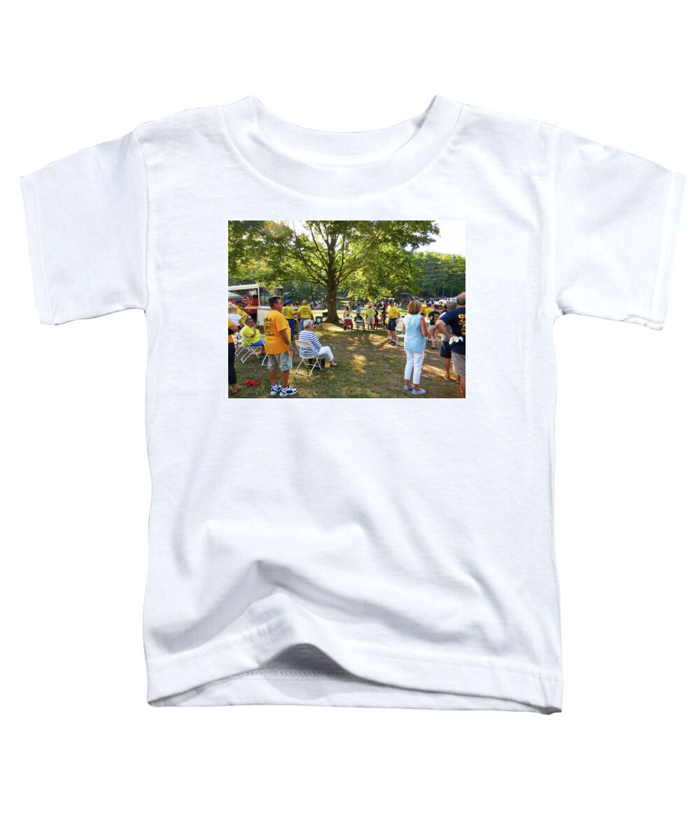 People Toddler T-Shirt featuring the painting People gathered along the road with their lawn chairs 4 by Jeelan Clark