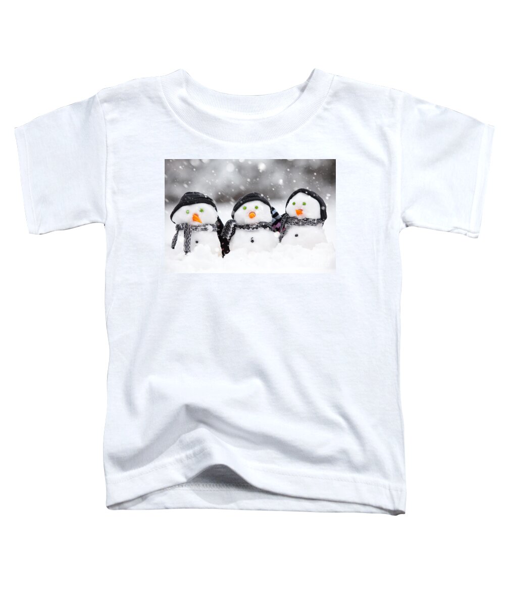 Christmas Toddler T-Shirt featuring the photograph Three cute snowmen by Simon Bratt