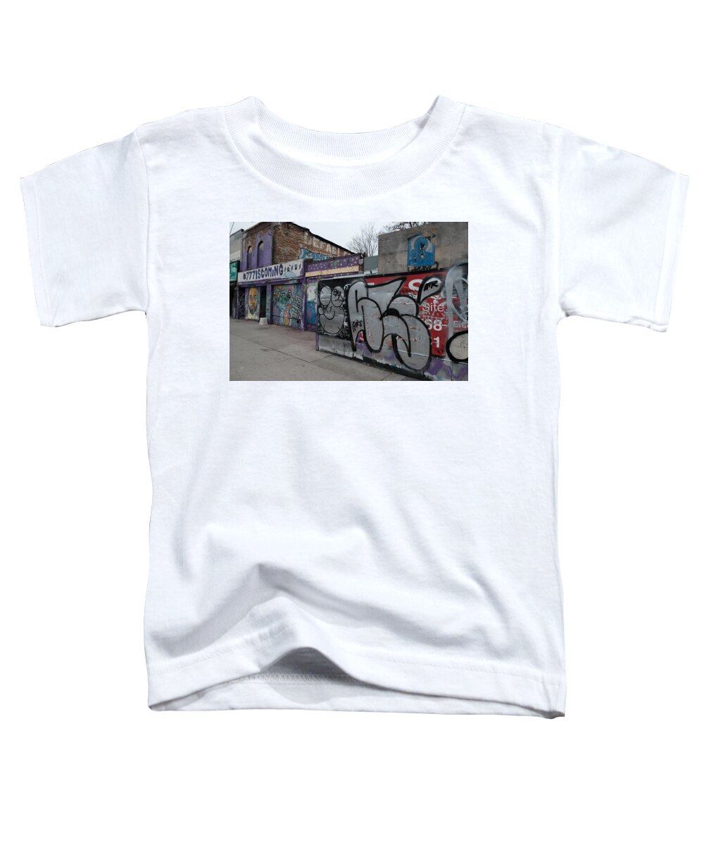 Urban Toddler T-Shirt featuring the photograph Cavity For A Decade by Kreddible Trout