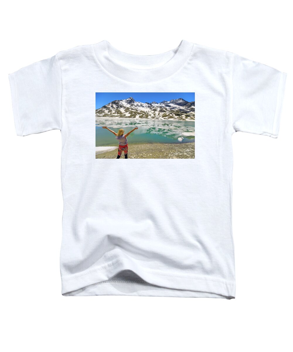 Switzerland Toddler T-Shirt featuring the photograph woman on Swiss White lake trekking #1 by Benny Marty