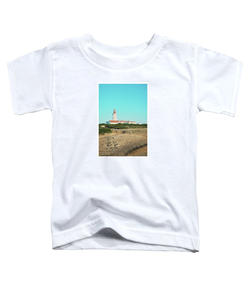 Lighthouse Toddler T-Shirt featuring the photograph Guiding us through the dark by Barthelemy De Mazenod