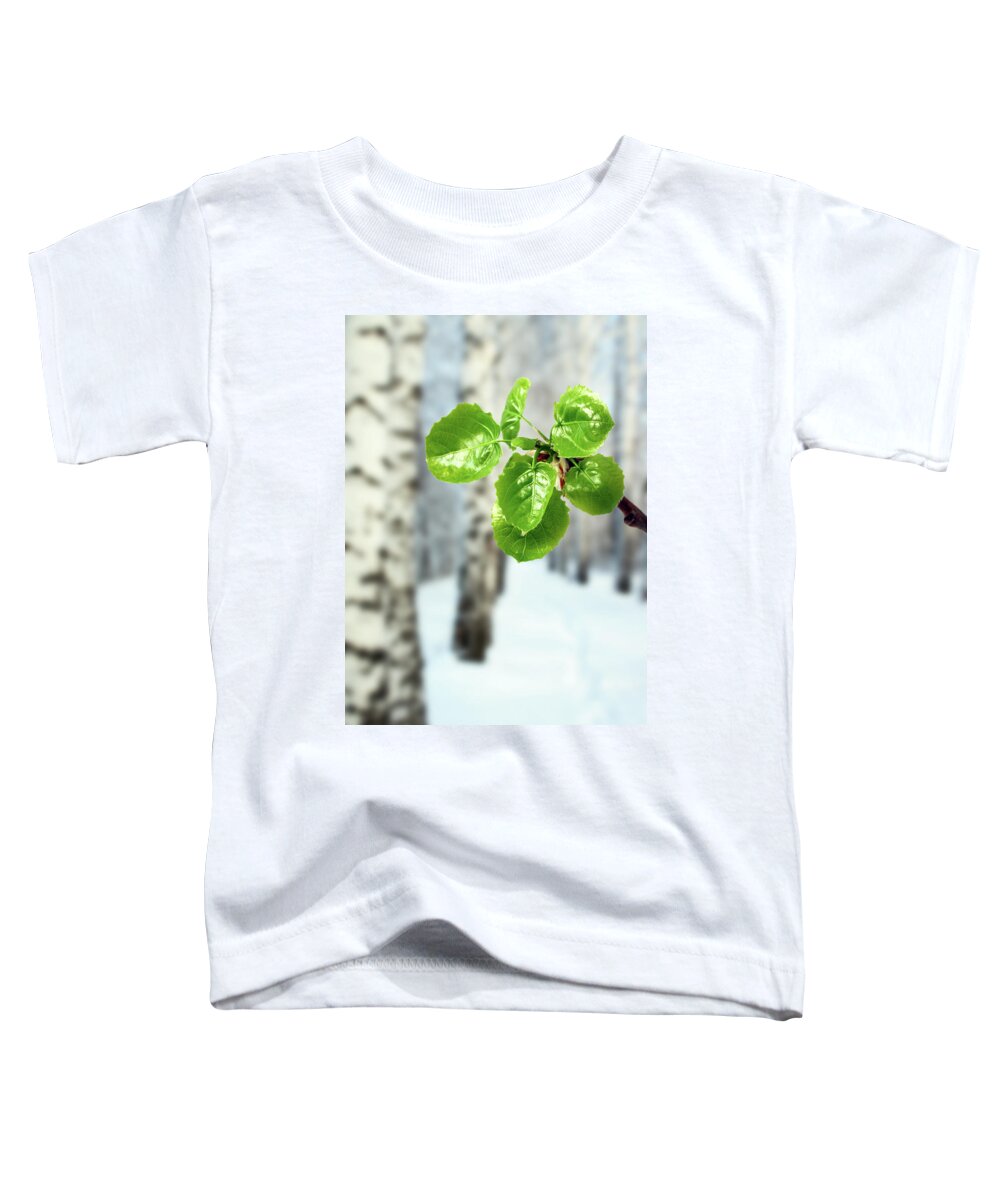 Isolated Toddler T-Shirt featuring the photograph New Green Leaves At Winter by Mikhail Kokhanchikov