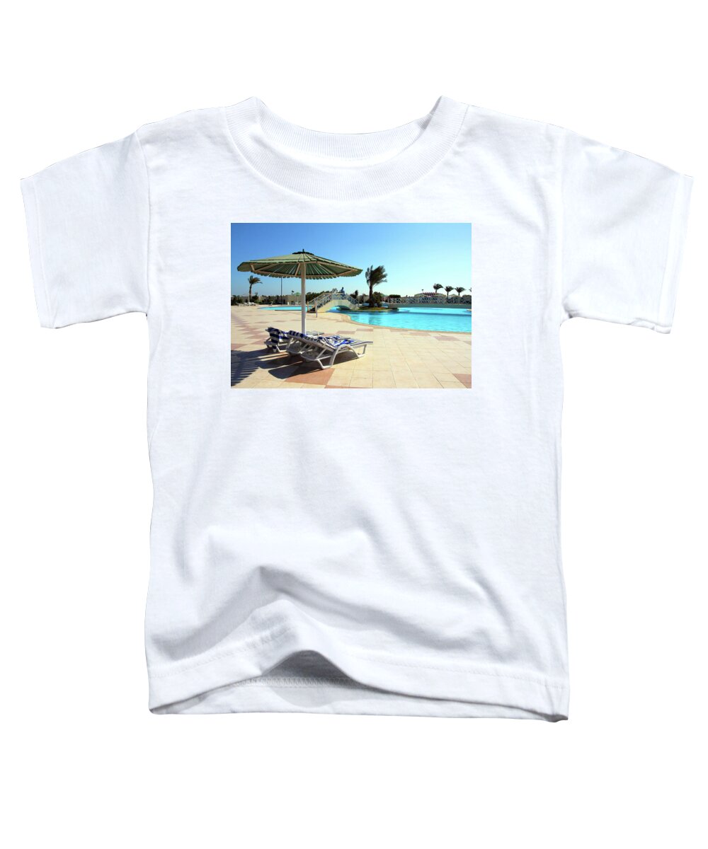 Tree Toddler T-Shirt featuring the photograph Parasol And Swimming Pool In Hotel by Mikhail Kokhanchikov