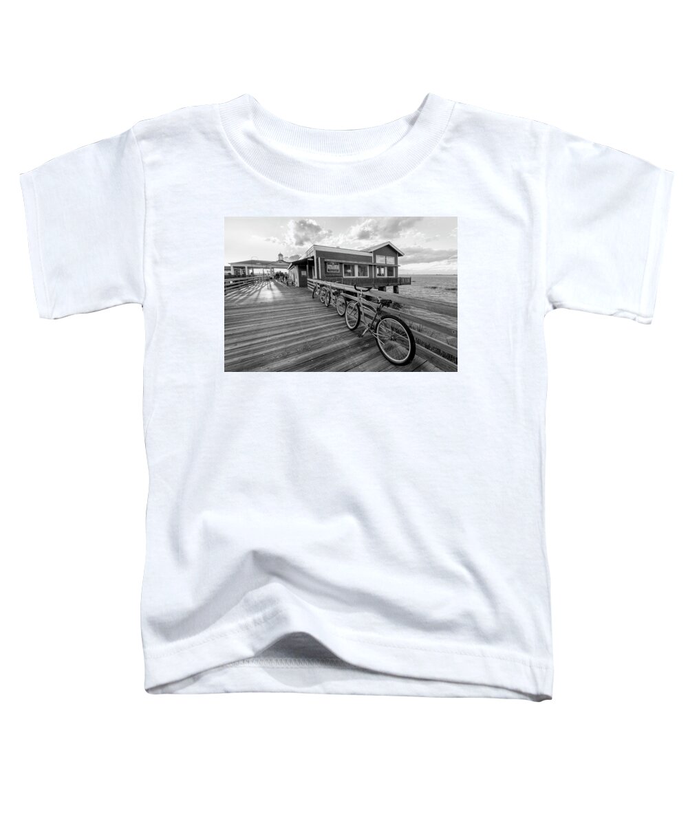 Black Toddler T-Shirt featuring the photograph Three Bicycles on the Dock Black and White Jekyll Island by Debra and Dave Vanderlaan