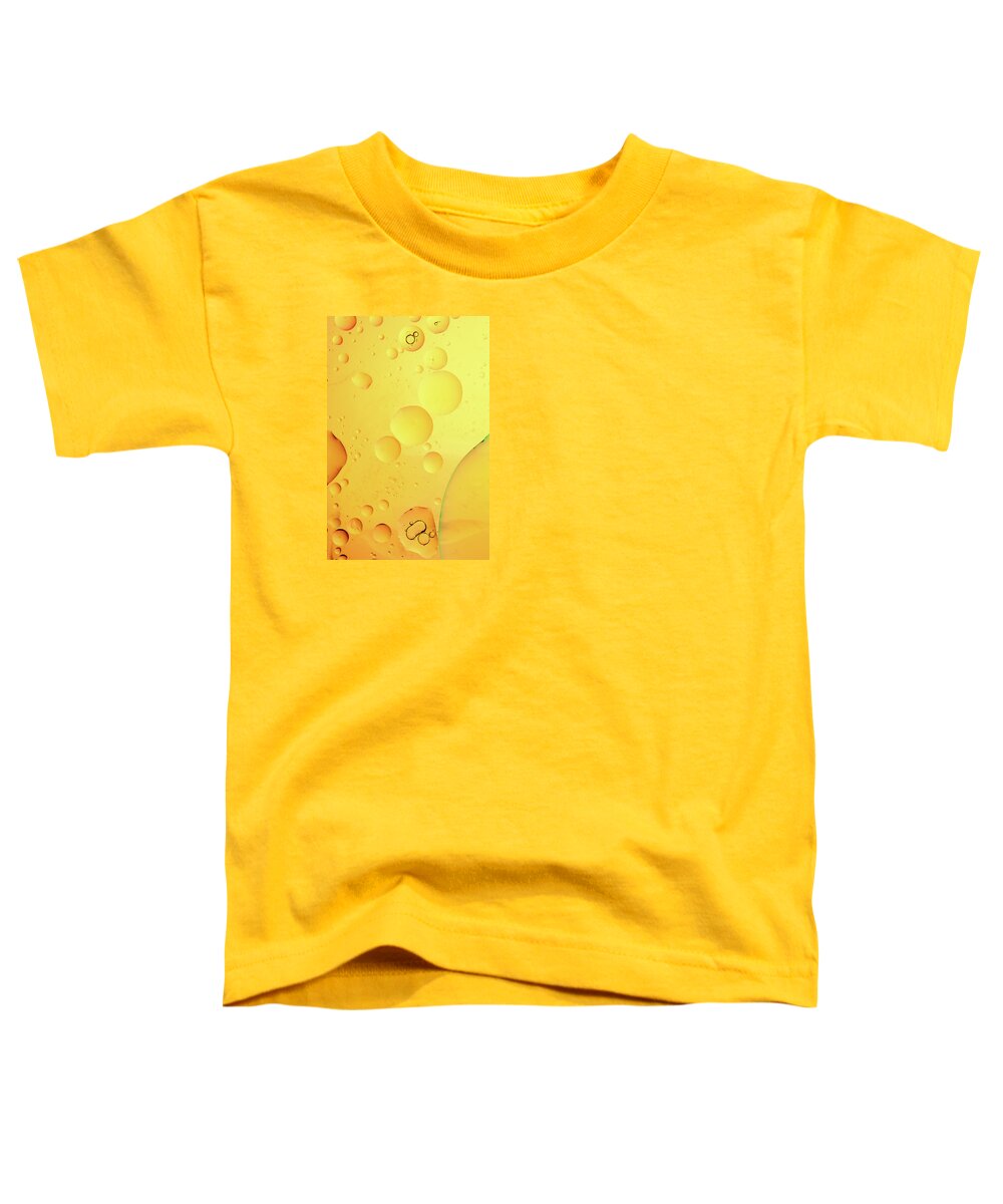 Fluid Toddler T-Shirt featuring the photograph Abstract, image of oil, water and soap with colourful background #6 by Michalakis Ppalis