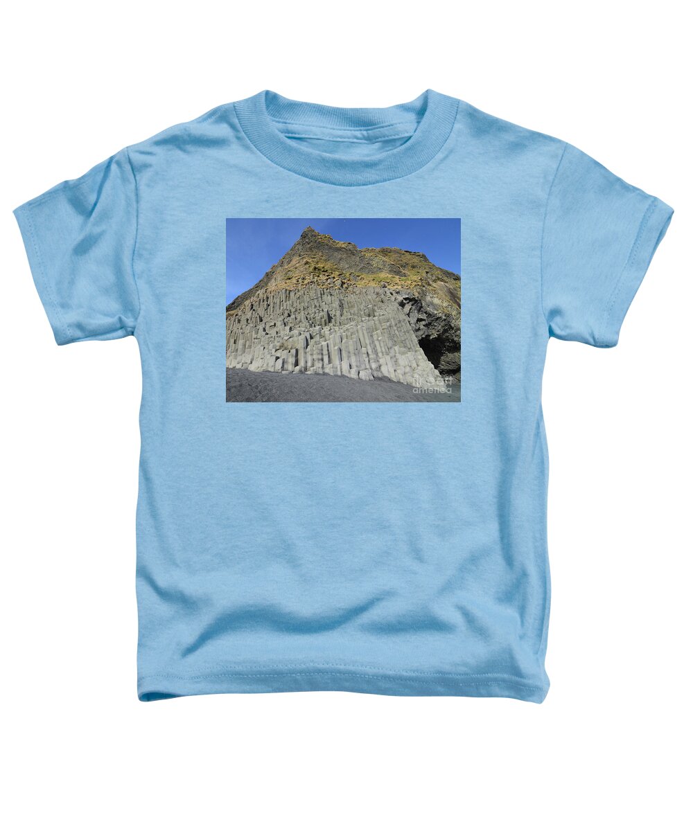 Basalt Toddler T-Shirt featuring the photograph Blue Skies Above the Basalt Columns on Black Sand Beach by DejaVu Designs