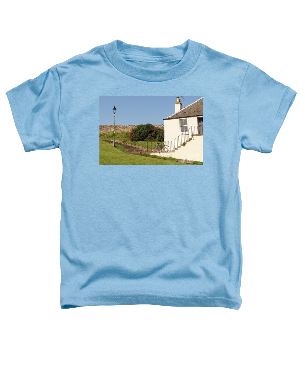 House On The Slope Toddler T-Shirt featuring the photograph House on the slope with a bike and a lamppost. by Elena Perelman