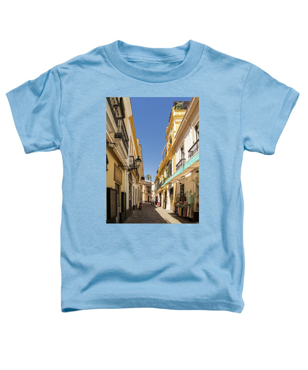 Too Hot To Shop Toddler T-Shirt featuring the photograph Too Hot to Shop - Barrio Santa Cruz Seville Spain by Georgia Mizuleva