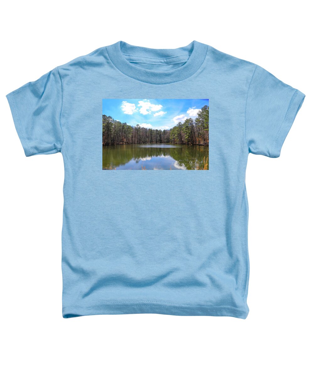 Lake Toddler T-Shirt featuring the photograph Silky Clouds Over Blue Sky at Sibley Pond by Marcus Jones