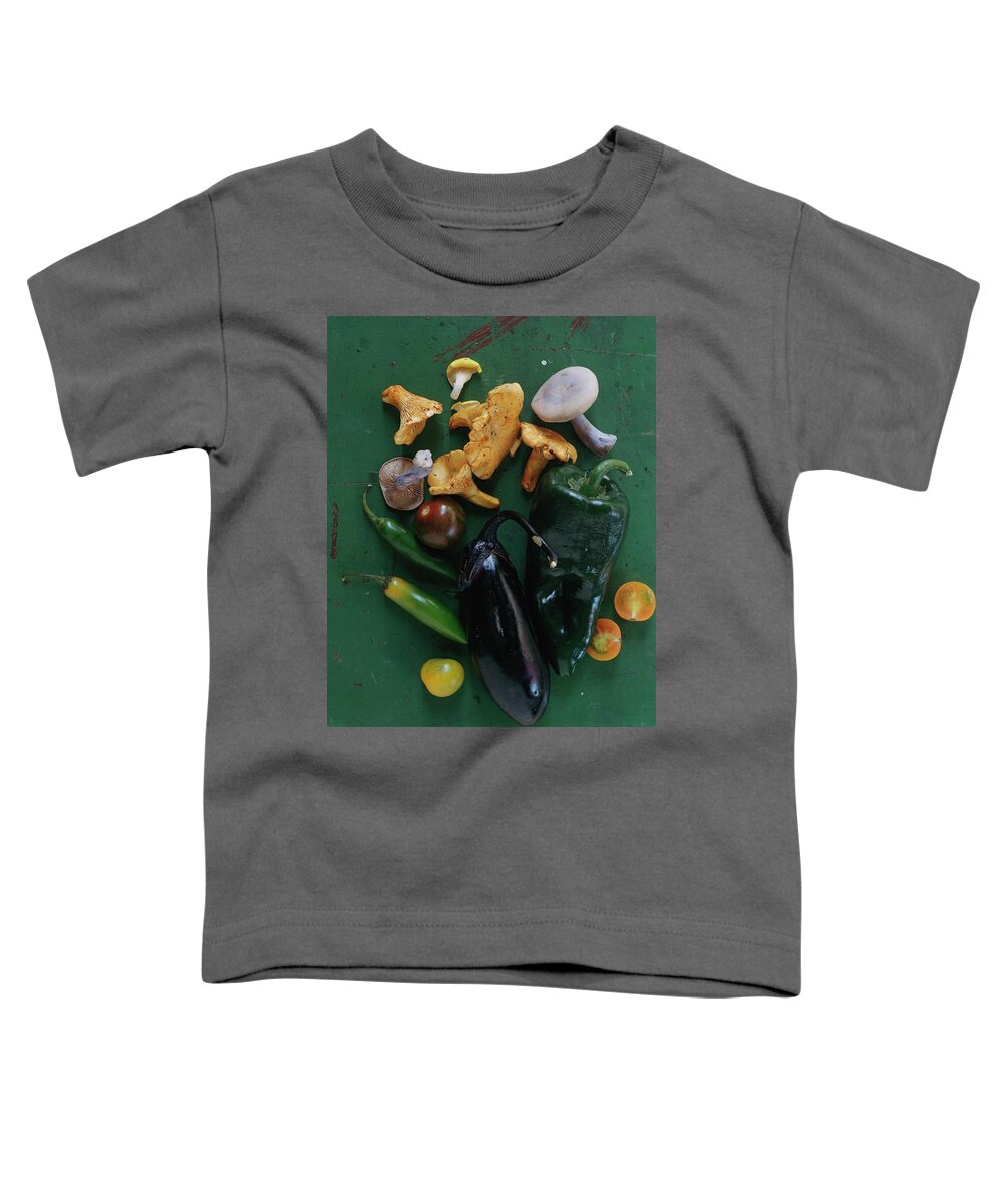 Fruits Toddler T-Shirt featuring the photograph A Pile Of Vegetables by Romulo Yanes