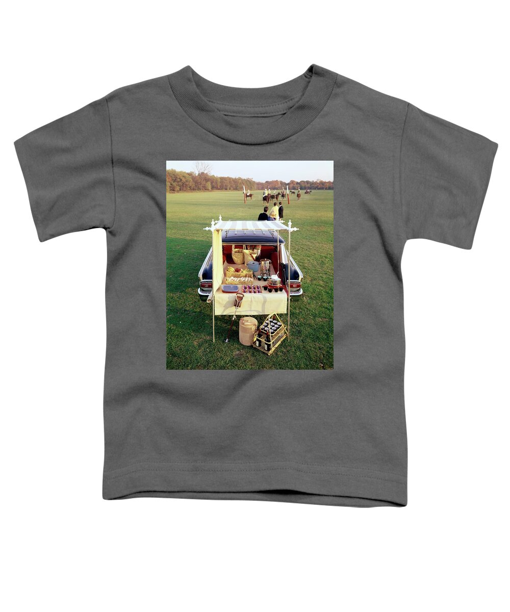 Food Toddler T-Shirt featuring the photograph A Picnic Table Set Up On The Back Of A Car by Rudy Muller