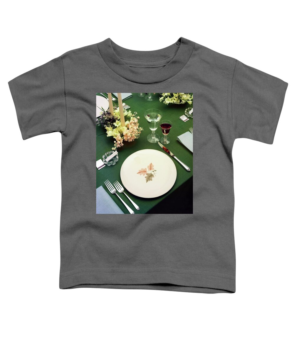 Nobody Toddler T-Shirt featuring the photograph A Table Setting On A Green Tablecloth by Haanel Cassidy
