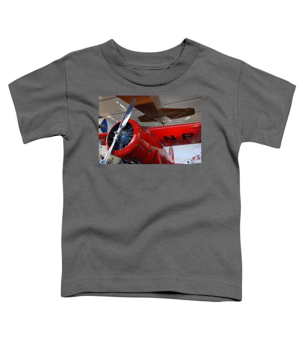 Amelia Earhart Toddler T-Shirt featuring the photograph Amelia Earhart Prop Plane by Kenny Glover
