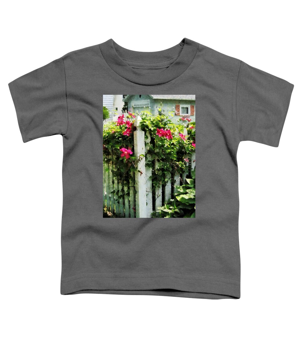 Clematis Toddler T-Shirt featuring the photograph Clematis on Fence by Susan Savad
