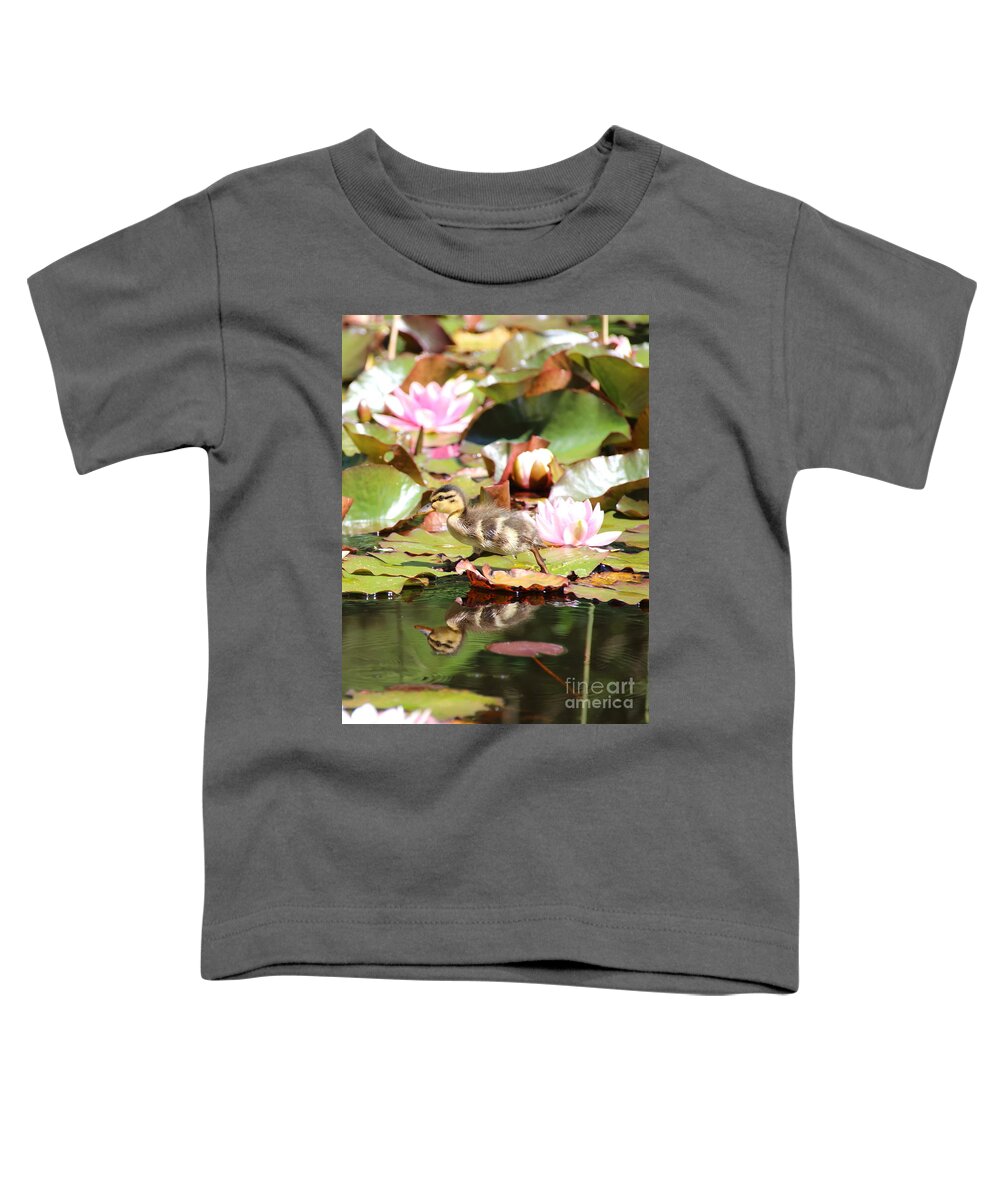 Ducklings Toddler T-Shirt featuring the photograph Duckling running over the Water Lilies 2 by Amanda Mohler