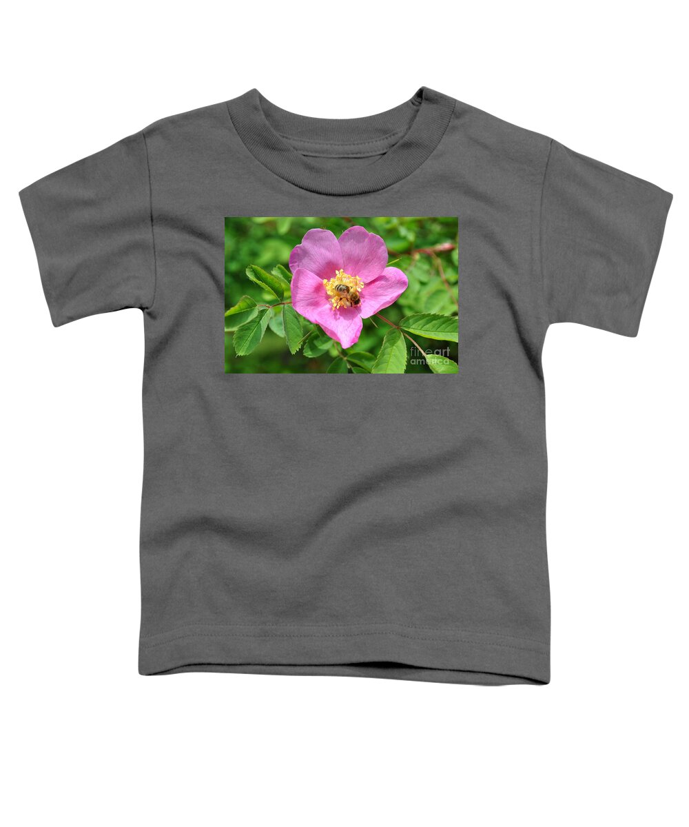 Rose Toddler T-Shirt featuring the photograph Hip rose bloom with a bee by Martin Capek