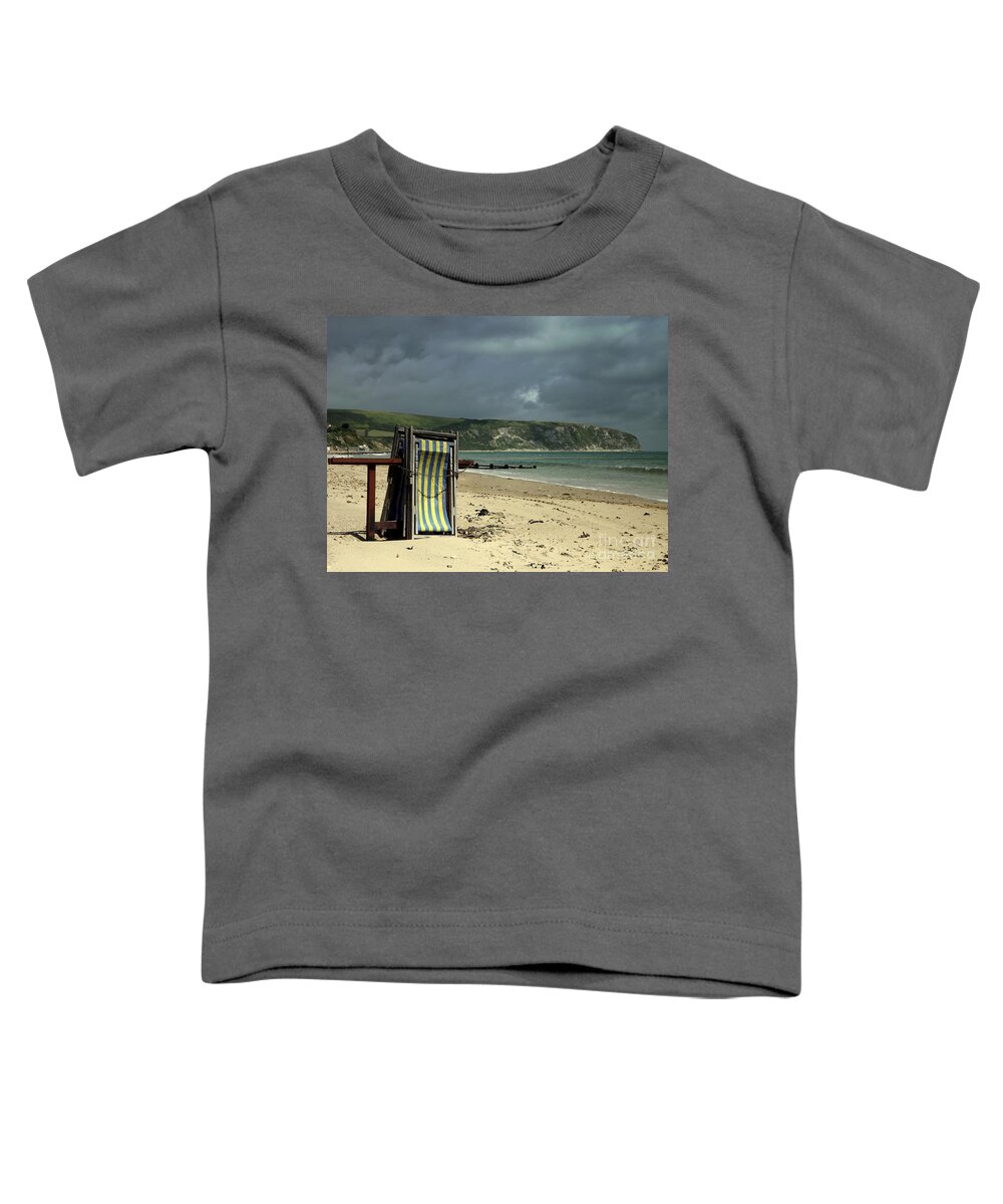 Swanage Toddler T-Shirt featuring the photograph Redundant deck chairs by Linsey Williams