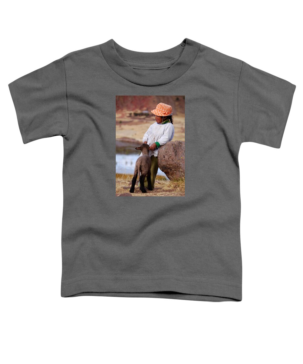 Girl Toddler T-Shirt featuring the photograph Sillustani Girl with hat and lamb by RicardMN Photography