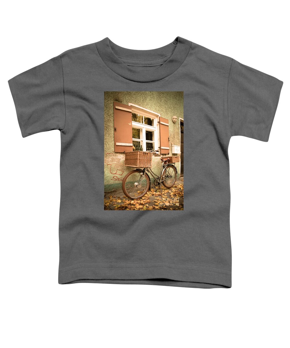 Autumn Toddler T-Shirt featuring the photograph The Bicycle by Hannes Cmarits
