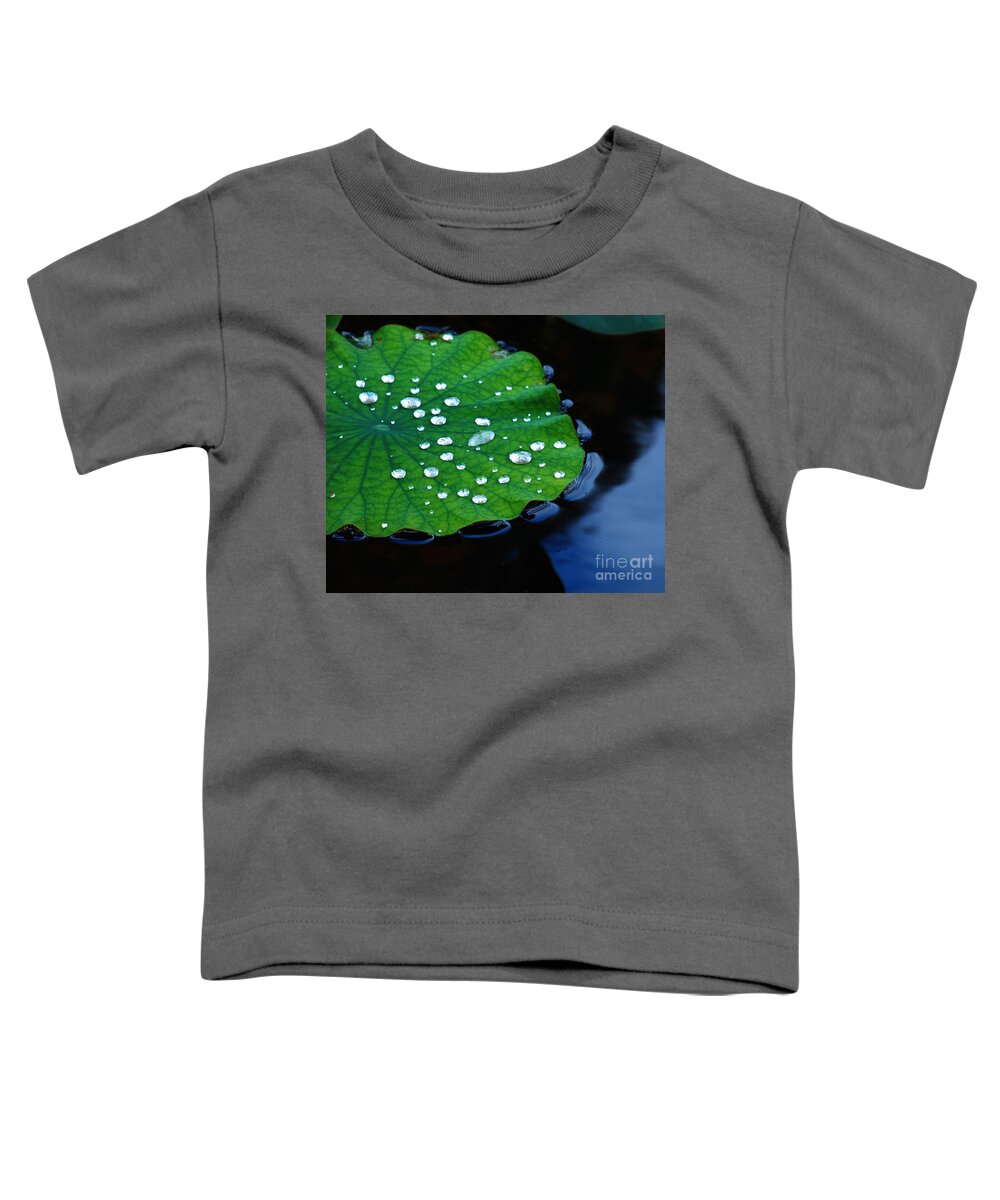 Water Toddler T-Shirt featuring the photograph Waterdrops on Lilypad by Nancy Mueller