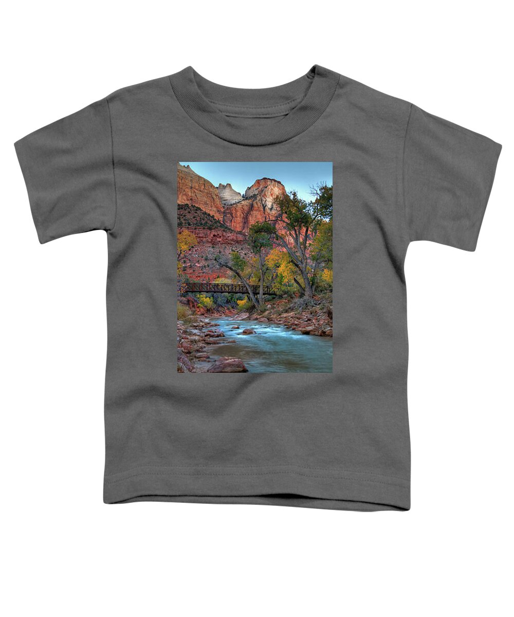 The Waters Of The Virgin River Flow Beneath A Foot Bridge Amidst Autumn Colored Cottonwoods And Towering Red Cliffs. Toddler T-Shirt featuring the photograph Zion National Park #22 by Douglas Pulsipher