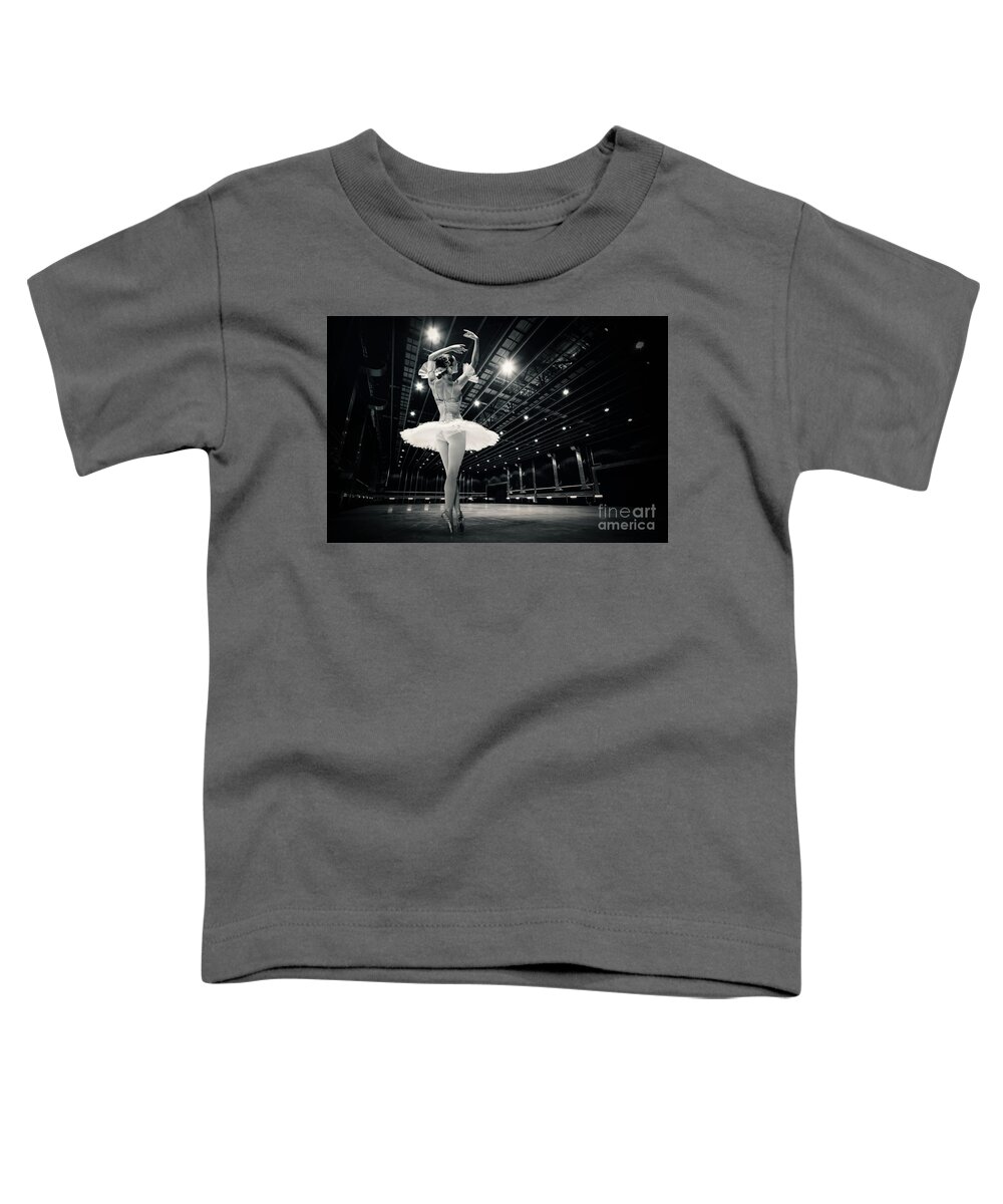 Ballet Toddler T-Shirt featuring the photograph A beautiful ballerina dancing in studio by Dimitar Hristov