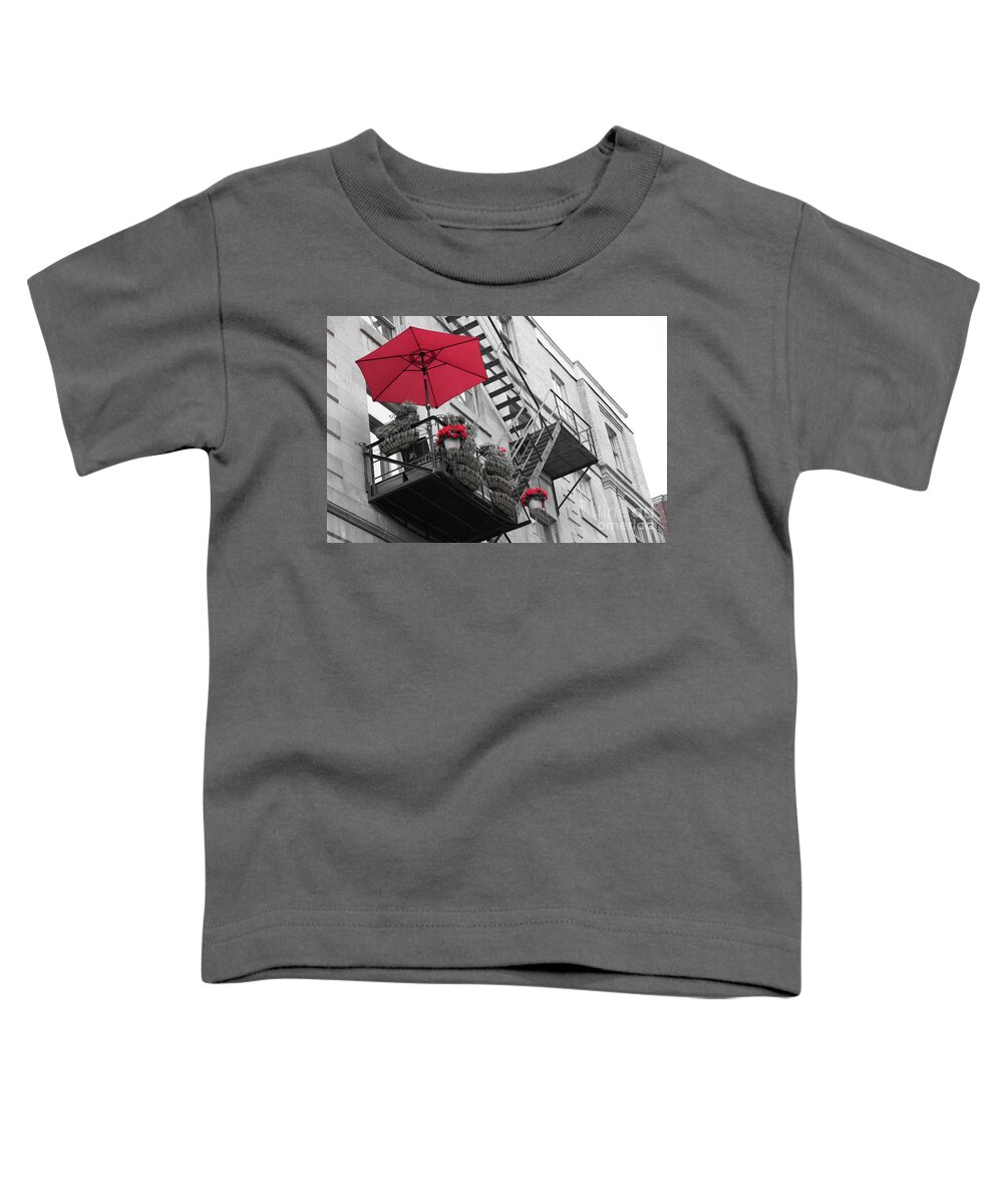 Canada Toddler T-Shirt featuring the photograph A red umbrella on a balcony by Agnes Caruso